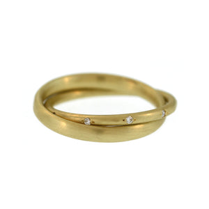 An Entwined Asymmetrical Yellow Gold Ring with Diamonds