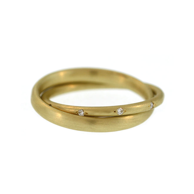 An Entwined Asymmetrical Yellow Gold Ring with Diamonds