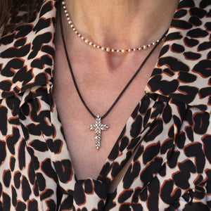 A Diamond Cross Pendant