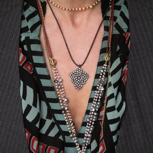 A Diamond Honeycomb Pendant in Blackened Silver