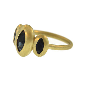 A Blue Sapphire Triple Lozenge Ring