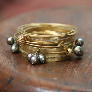 The Gold Bangle with Flower Bead