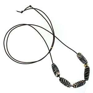 A Black + White Swirl Glass Bead Necklace
