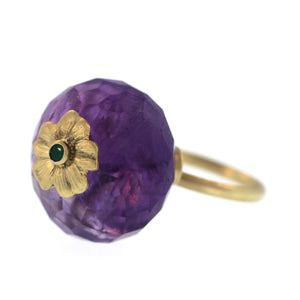 An Amethyst + Emerald Flower Ring