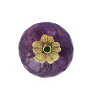 An Amethyst + Emerald Flower Ring