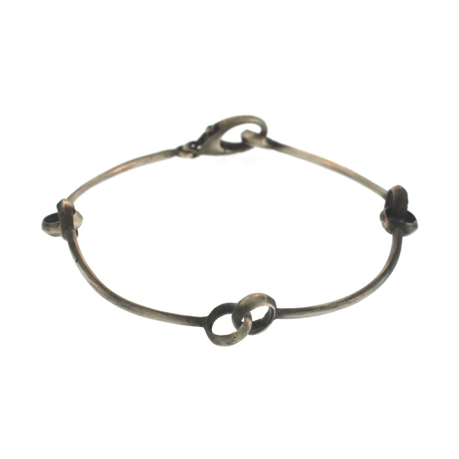 A Quad Hinged Bangle in Oxidized Sterling Silver