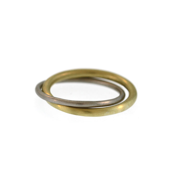 An Entwined Asymmetrical Platinum + Yellow Gold Ring