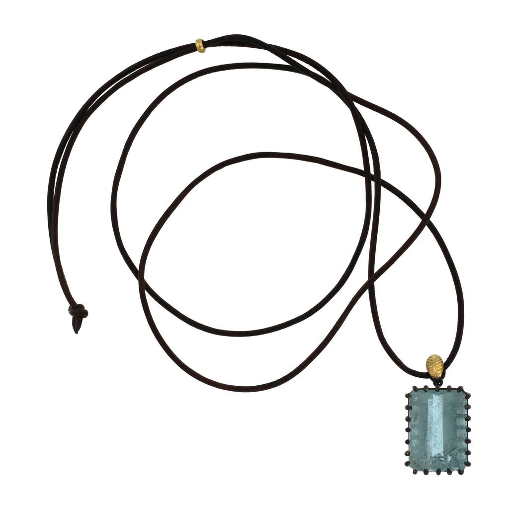 An Aquamarine + Lotus Leaf Pendant