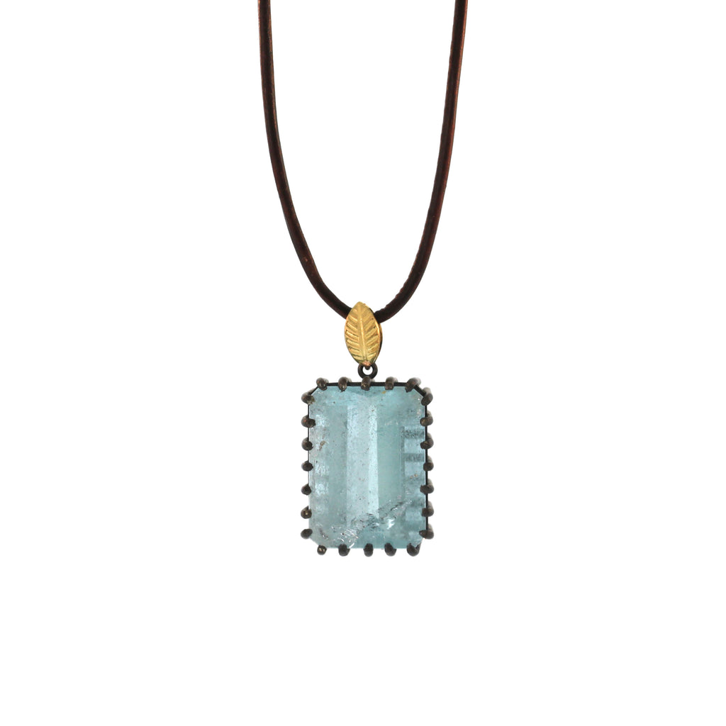 An Aquamarine + Lotus Leaf Pendant