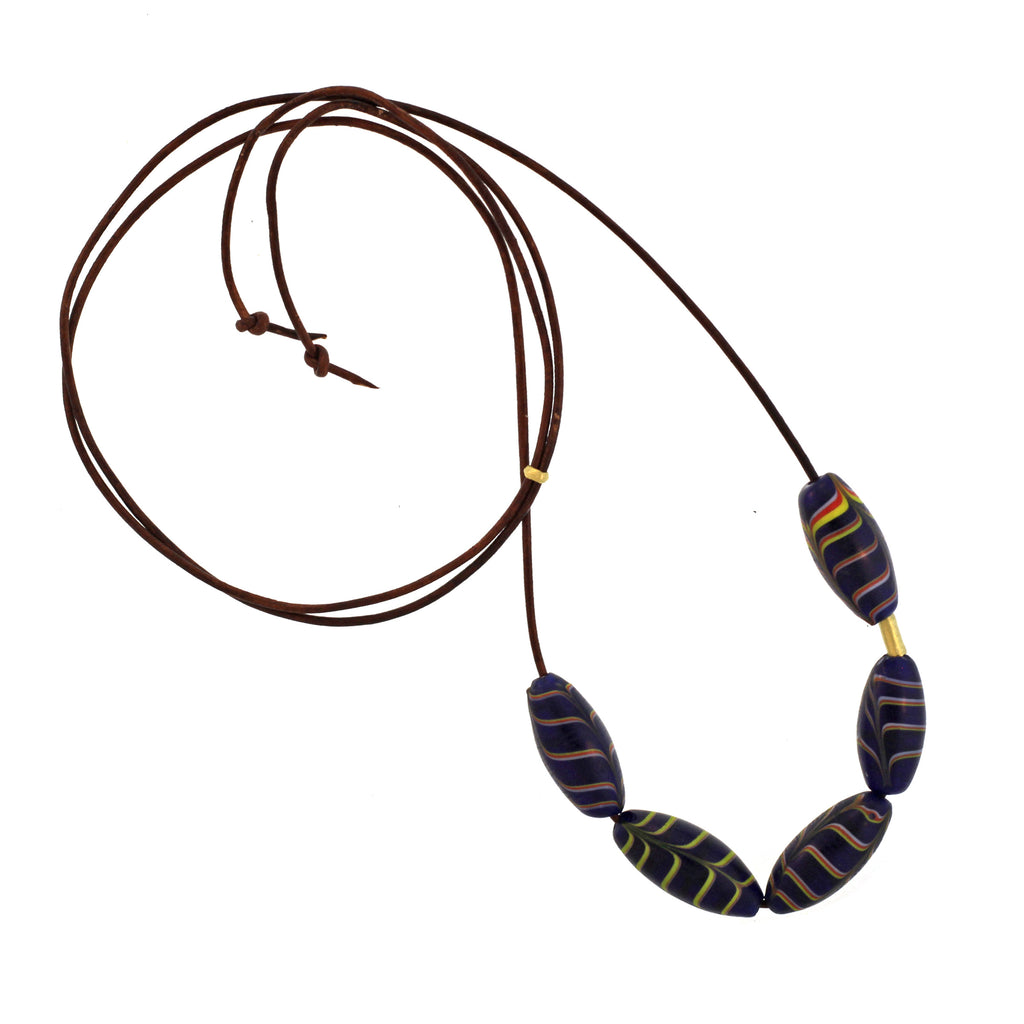 An Oblong Dark Blue Swirled Bead Necklace