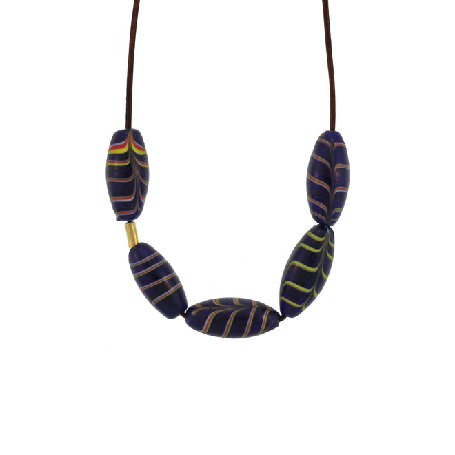 An Oblong Dark Blue Swirled Bead Necklace