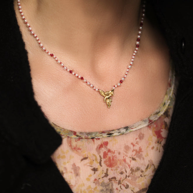An Angel Necklace with Pearls and Rubies