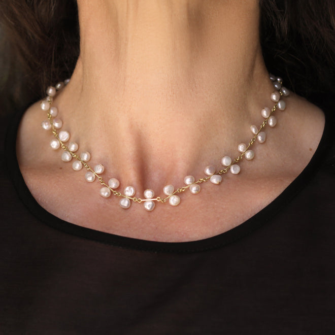 A Linked Bar Chain with Pearls