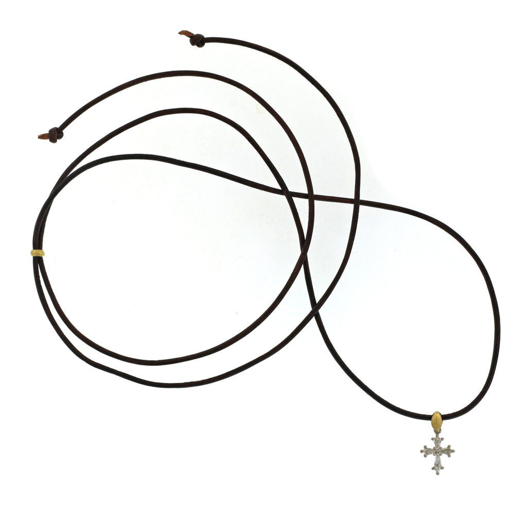 A Petite Diamond Cross Pendant