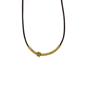 A Gold Tube and Double Bali Bead Necklace