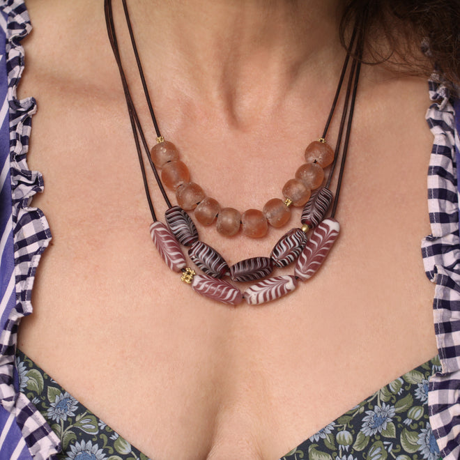 An Indonesian Pink + White Swirl Glass Bead Necklace