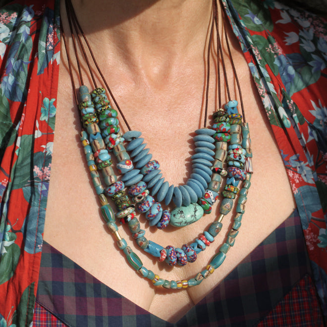 A Mixed Striped + Marbled Vintage Trade Bead Necklace on Leather Cord - Turquoise + Red