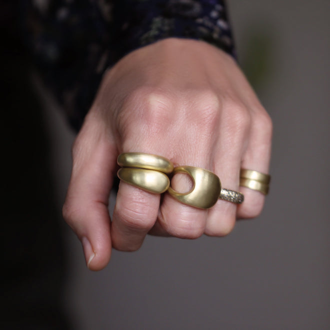 An Asymmetric Cutout Ring
