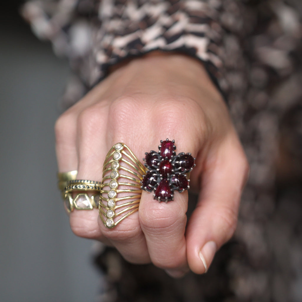 A Garnet Cabochon Cluster Ring