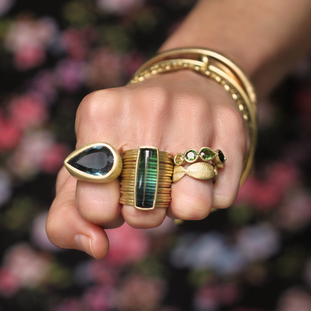A Five Stone Green Tourmaline Ring
