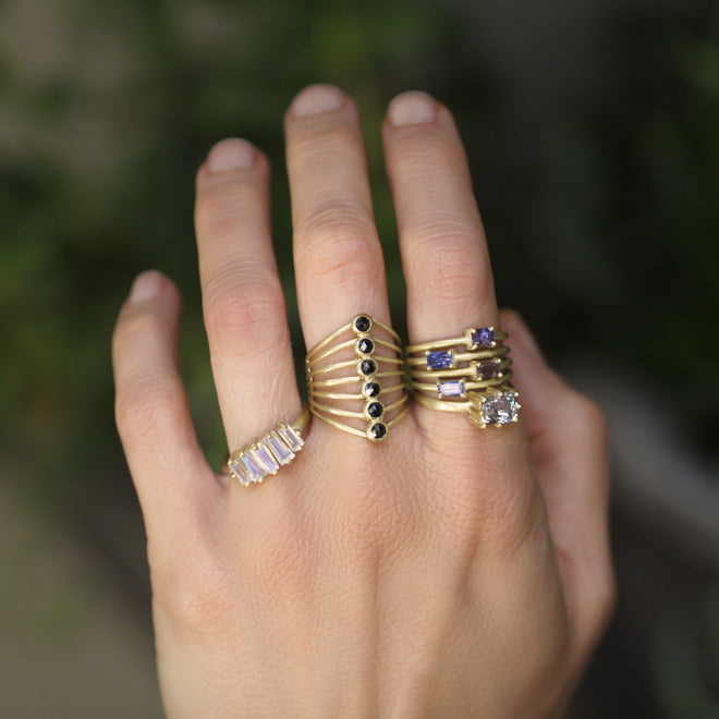 A Six-Stone Black Diamond Vertebrate Ring