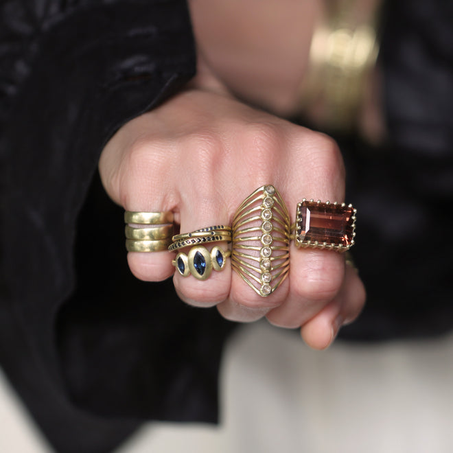A Blue Sapphire Triple Lozenge Ring