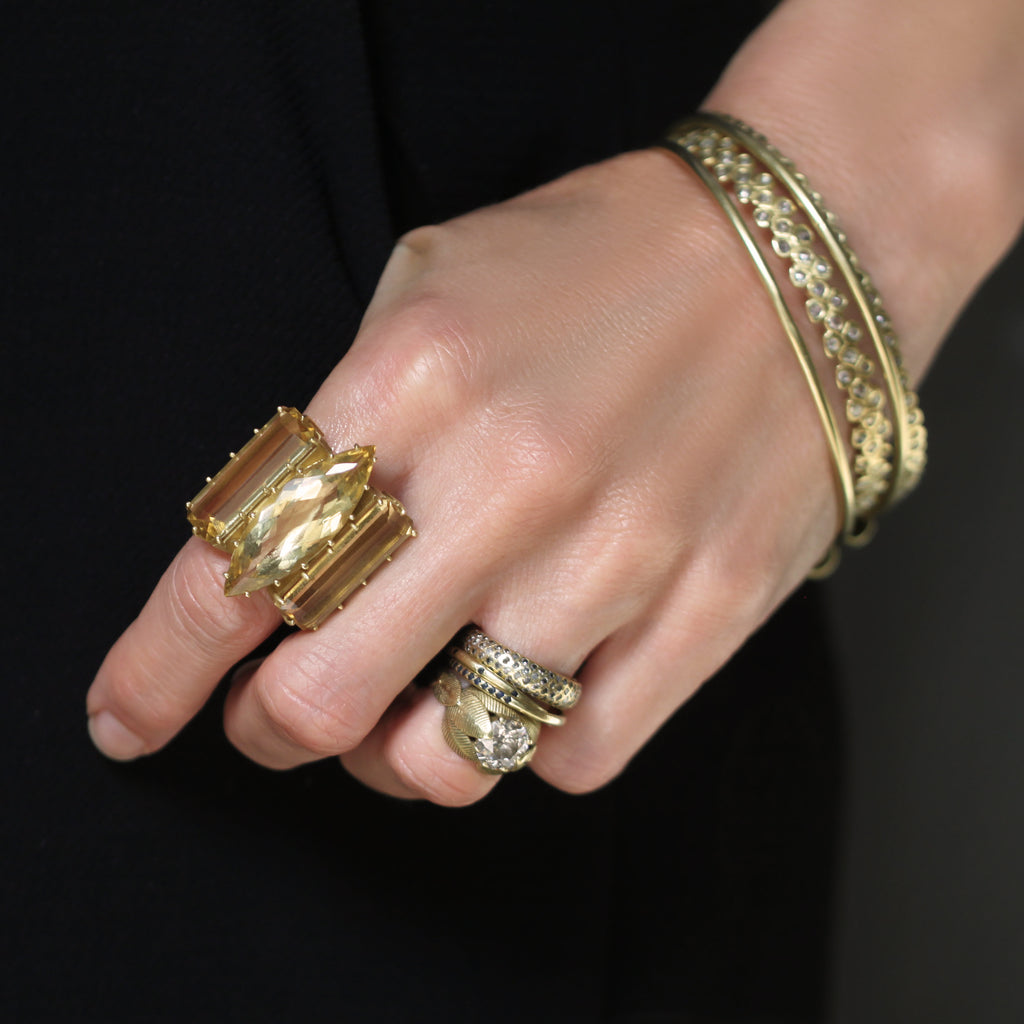 A Triple Golden Beryl Ring