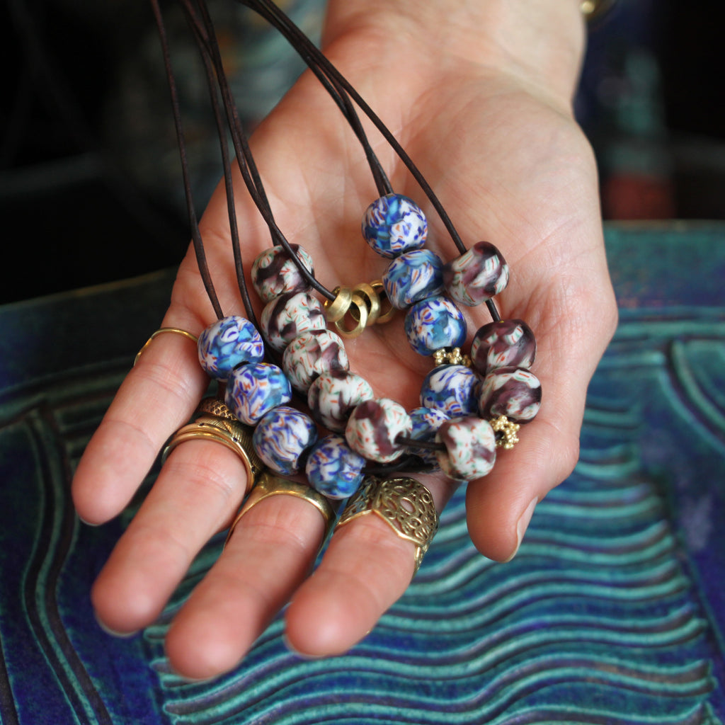 A Blue Patterned Recycled Glass Bead Necklace