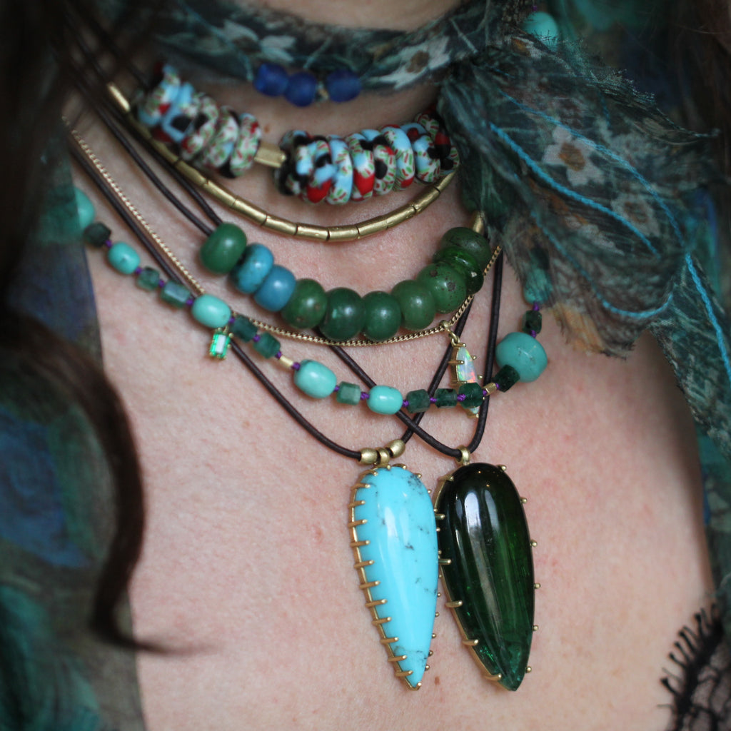 An Emerald, Turquoise and Gold Bead Necklace