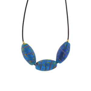 An Oblong Blue Patterned Bead Necklace