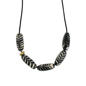 A Black + White Swirl Glass Bead Necklace