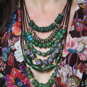 A Green Speckled Glass Bead Necklace