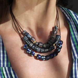 A Blue, Grey, + Red Patterned Bead Necklace