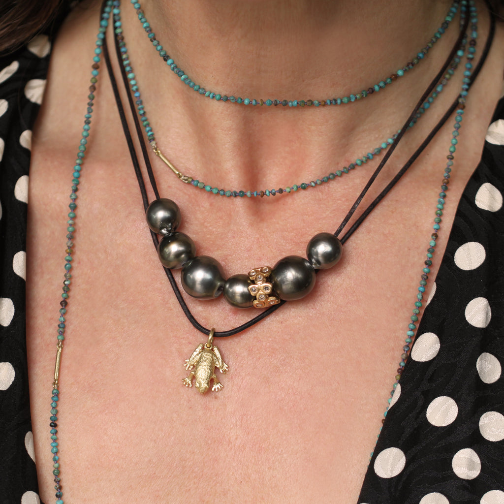A Tahitian Pearl Necklace with 18K Rose Gold + Diamond Bead on Leather
