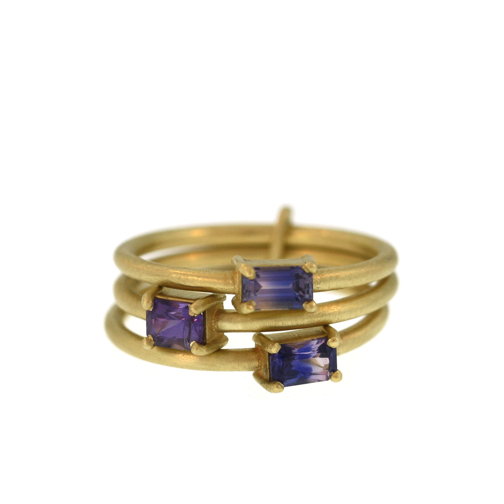 A Three Part Violet Sapphire Ring